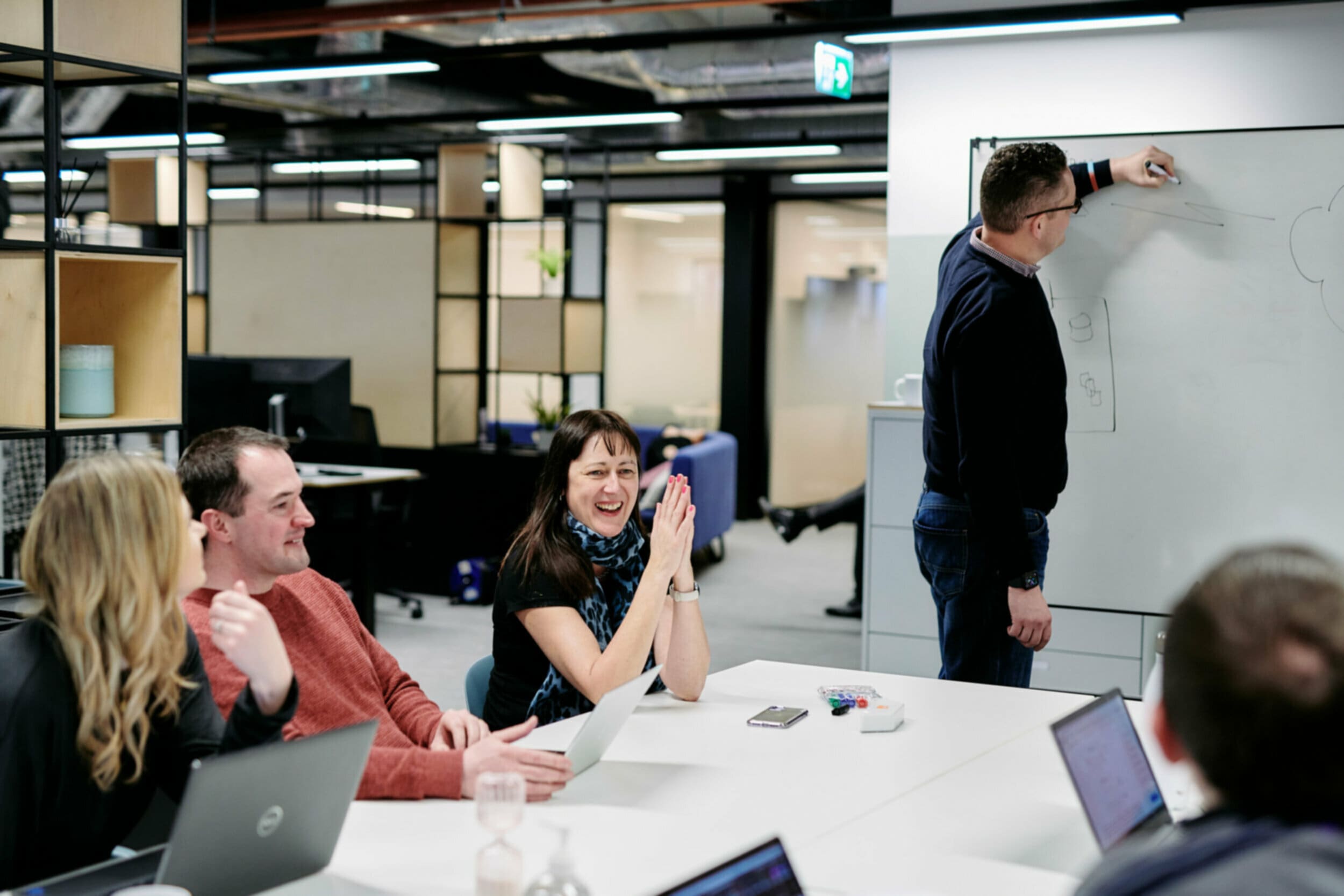 people working in a meeting room