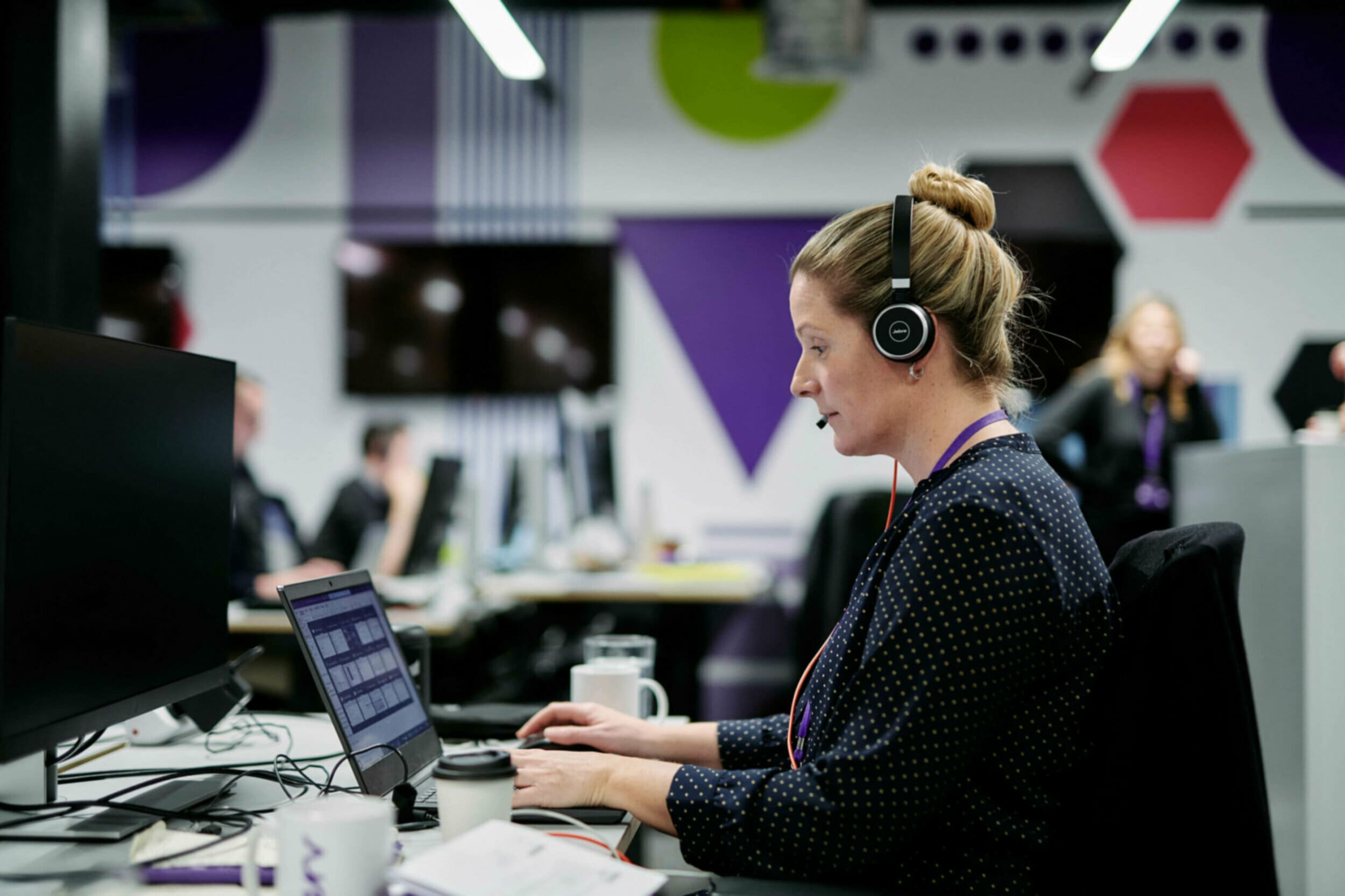 woman using recorded unified comms on laptop