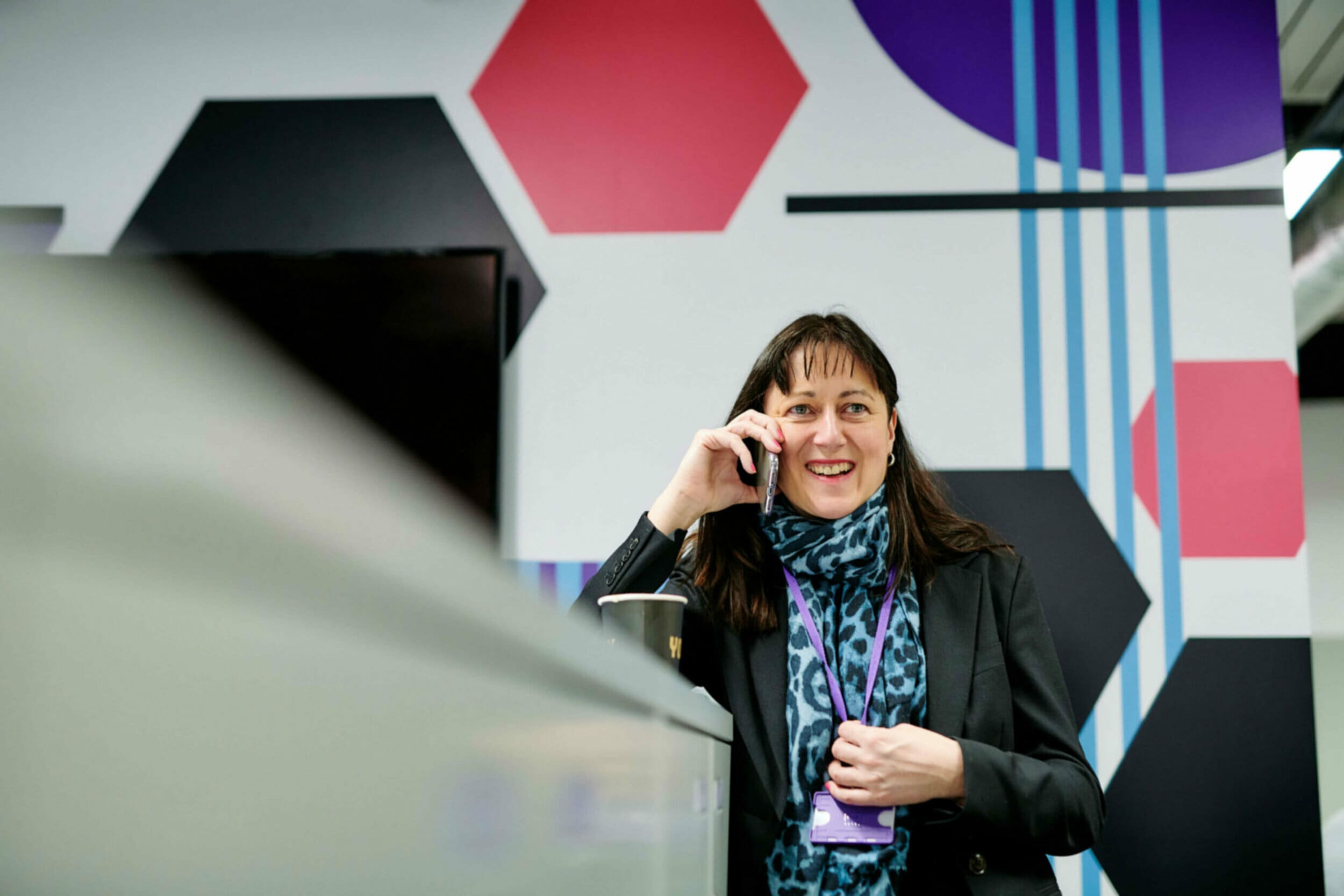 woman on the phone smiling