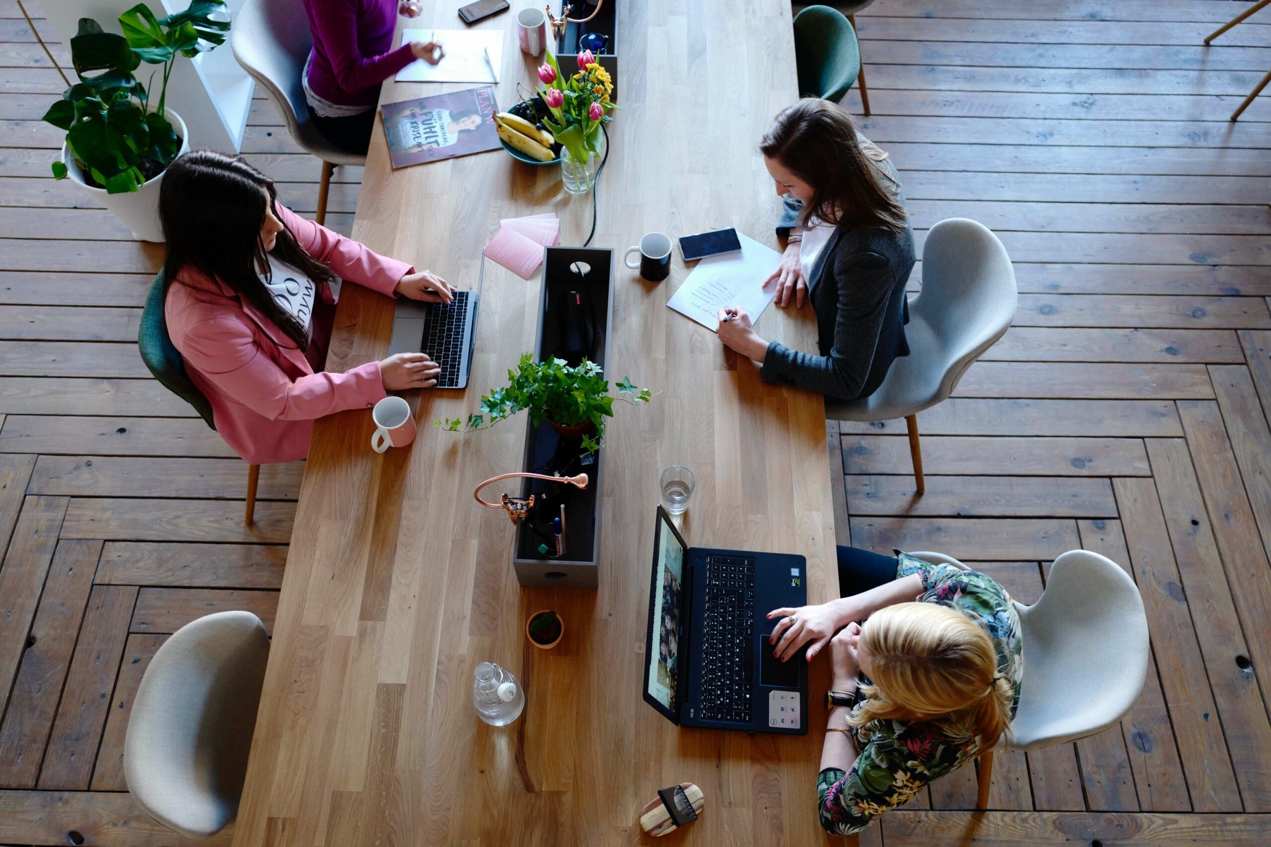 Arial photo of women working at a desk