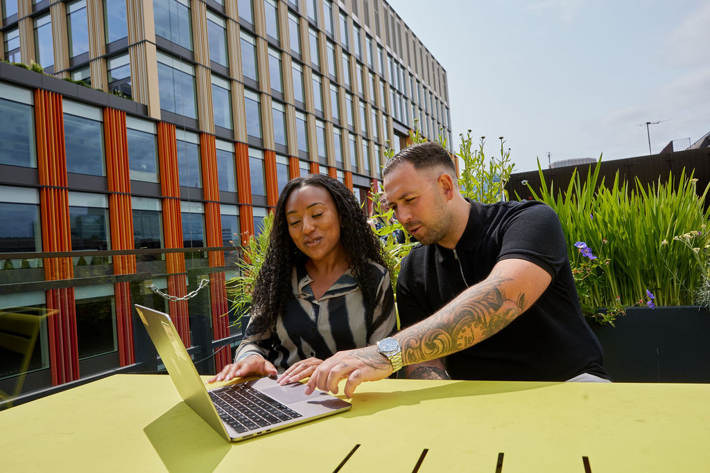 Two people working